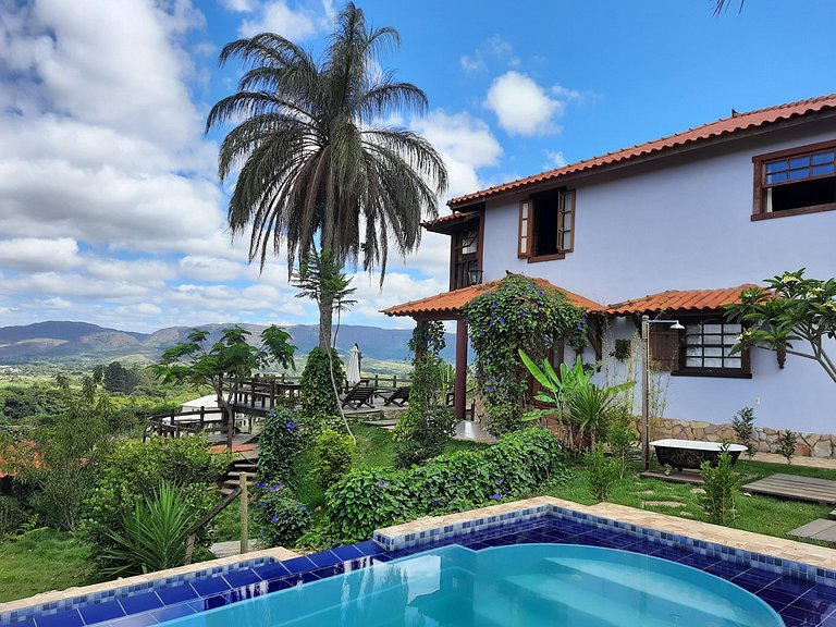 Suíte com terraço e vista pra serra