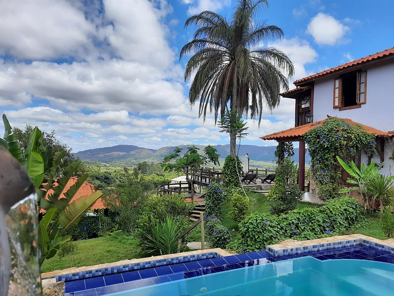 Suíte com terraço e vista pra serra