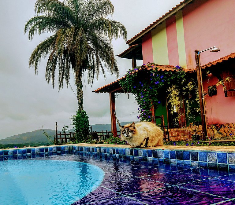 Suíte com terraço e vista pra serra