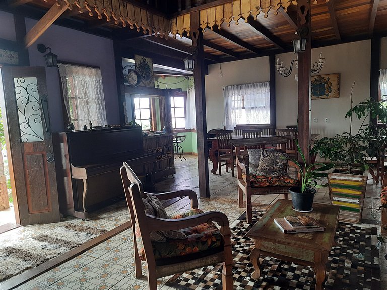 Suíte com terraço e vista pra serra