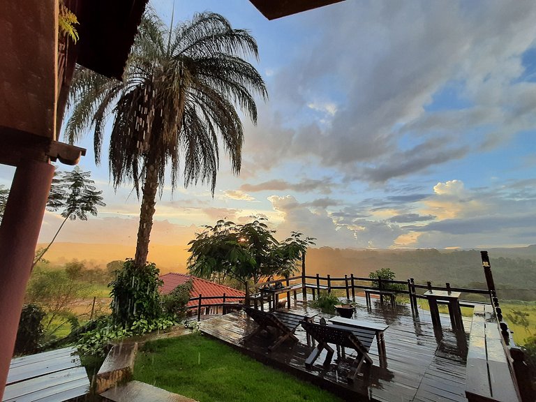 Suíte com terraço e vista pra serra