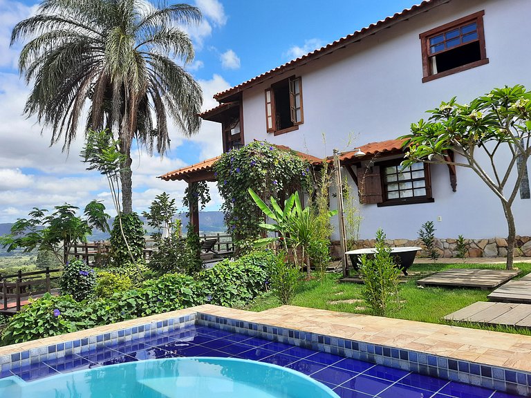 Suíte com terraço e vista pra serra