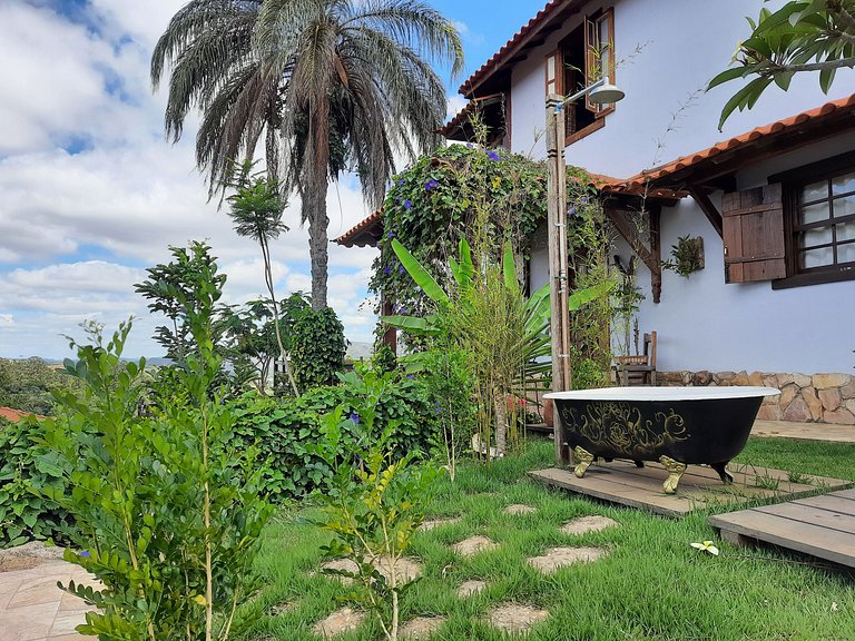 Suíte com terraço e vista pra serra