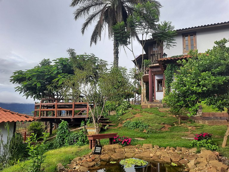 Suíte com terraço e vista pra serra